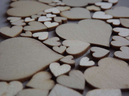 valentines day greeting card-wooden hearts on a gray suede background. High quality photoの写真素材