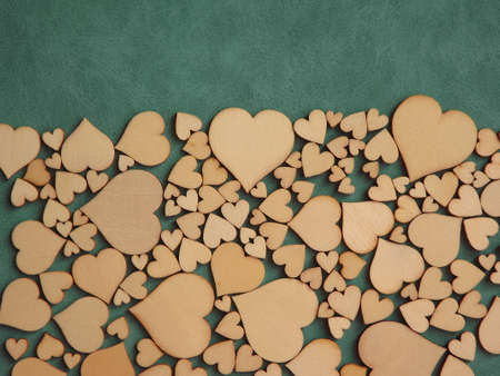 valentines day greeting card-wooden hearts on a gray suede background. High quality photoの写真素材