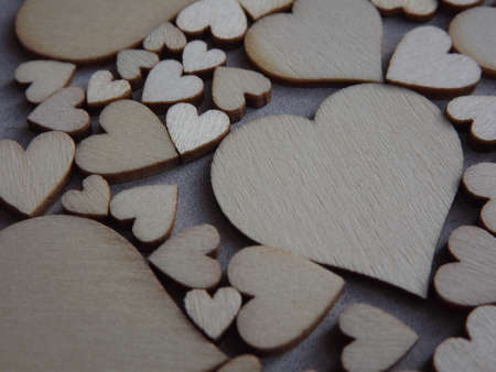 valentines day greeting card-wooden hearts on a gray suede background. High quality photoの写真素材