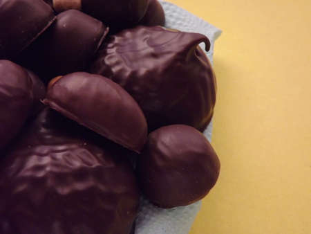 chocolate candies, marshmallows, marmalade and various nuts close-up. High quality photo