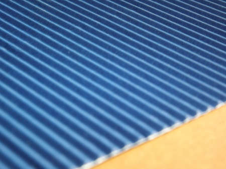 Blue green surface graphic design with clear lines and a ribbed surface as the background. High quality photoの写真素材