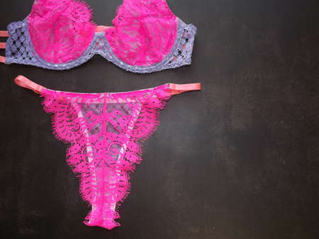 A set of womens underwear from panties bra and stockings belt in pink and blue. High quality photoの写真素材