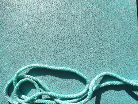 Genuine leather and genuine suede turquoise blue close-up as background. high quality photoの写真素材