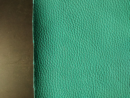 Genuine leather and genuine suede turquoise blue close-up as background. High quality photoの写真素材