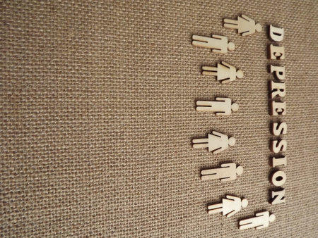 mental illness depression in wooden letters on a black background. High quality photoの写真素材