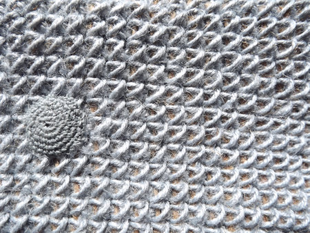 Crocheting of jute, yarn, raffia blue in a circle close-up as a background. High quality photo