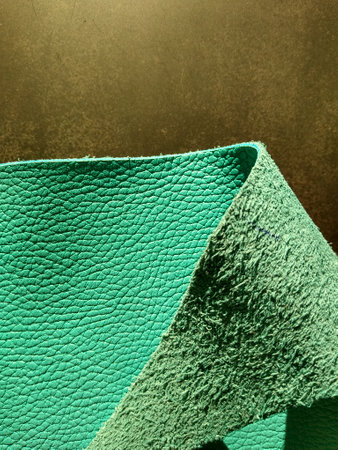 Genuine leather and genuine suede turquoise blue close-up as background. High quality photoの写真素材