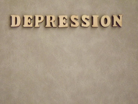 mental illness depression in wooden letters on a black background. High quality photoの写真素材