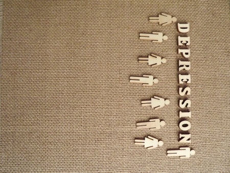 mental illness depression in wooden letters on a black background. High quality photoの写真素材