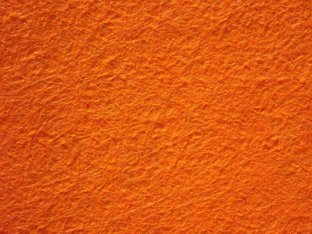 Orange background with structured surface imitation felt. High quality photoの写真素材