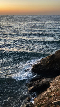 Beautiful seascape with sea waves at sunset. Natural backgroundの写真素材