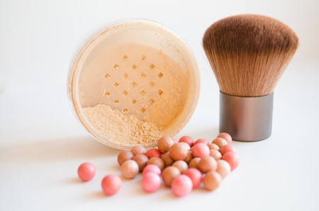 makeup brush and cosmetics, on a white backgroundの写真素材