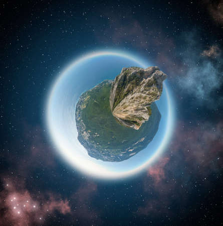 Concept of small planet in space from 360 degree panoramaの写真素材