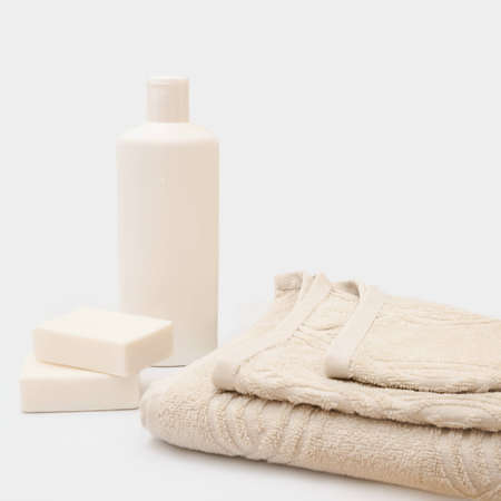 Terry towel, shampoo treatment, and two pieces of scented soapの写真素材