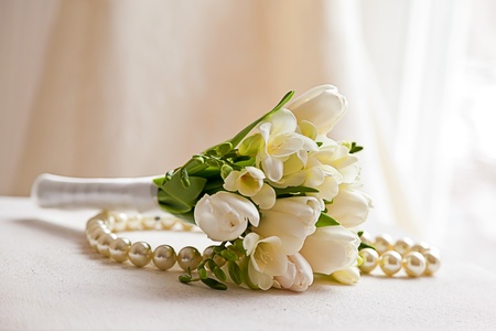 Wedding bouquet with pearl necklaceの写真素材
