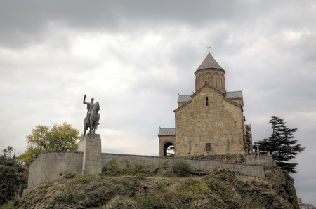 Monument to the founder of the city Tsar Vakhtang Gorgasali and the Metekhi temple. Tbilisi....