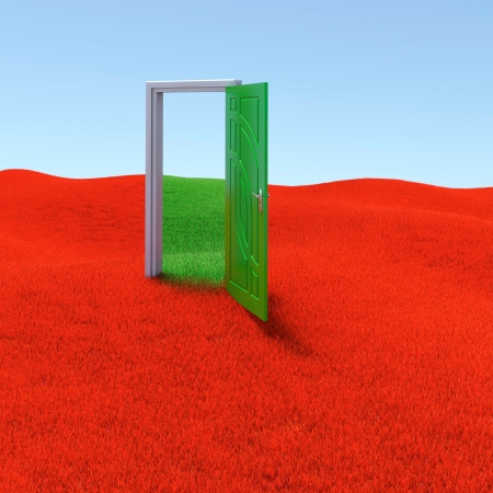 Green lawn with mysterious door opened to another realityの写真素材