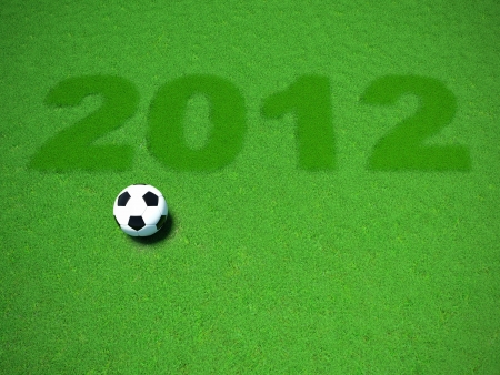 3D render of soccer ball on green lawnの写真素材