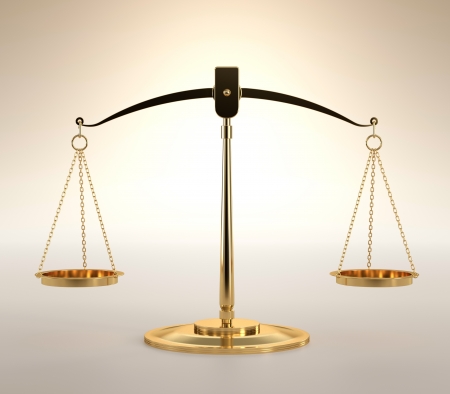 3D illustration of scales of justice on orange backgroundの写真素材