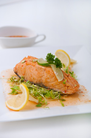 Spicy salmon salad with mixed vegetable , asian spicy foodの写真素材