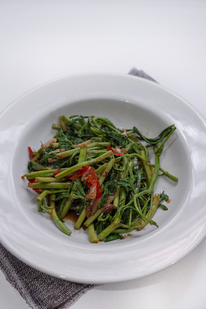 Fried water minosa white plate and selective focusの写真素材