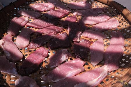 Long sliced of dried meat beef jerky dry and selective focusの写真素材