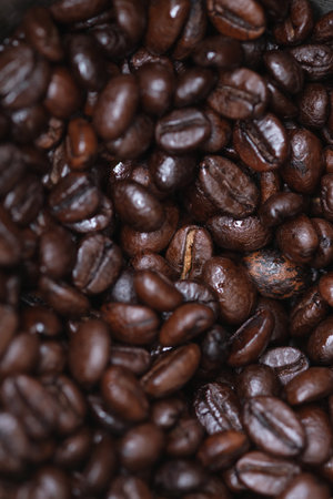 Brown coffee beans textures and surface for background and copy space for textの写真素材