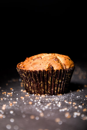 MUFFIN:
Sweet and moist single-serving bread which is heavier than a cake or cupcake and is baked with cup-sized indentationsの写真素材