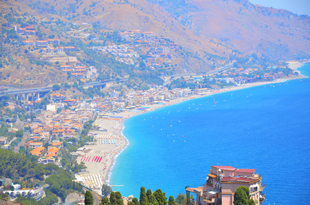 Spisone beach viewed from Taormina, Sicily, Italyの写真素材