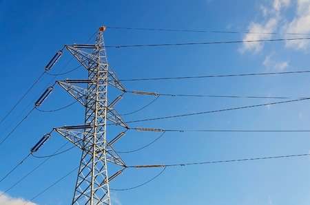 Power transmission tower on blue skyの写真素材