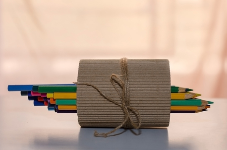 Colored pencils on vintage paper tinの写真素材