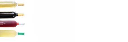 Different wines bottles red, white, rose and bordeaux on white background. Wine Collection Flat lay large image for banner with copy space.の写真素材