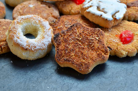 Close up of Mantecados, typical sweets consumed in Spain at Christmas. Spanish shortbread served on...