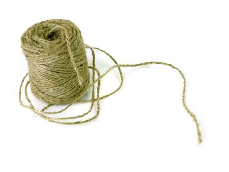 wrapped up skein of twine on white ground