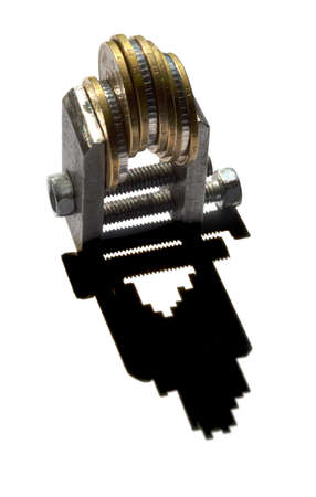 Coins clamped with a clamp on a white backgroundの写真素材