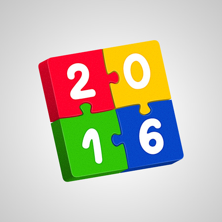 Multicolor New Year's jigsaw puzzles with white digits on gray background. New Year 2016 concept