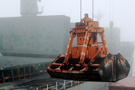 cargo bucket on the ship overloads the coal