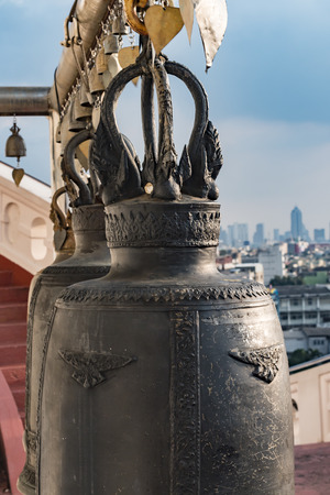 the bells in Buddhist temple Bangkokの写真素材