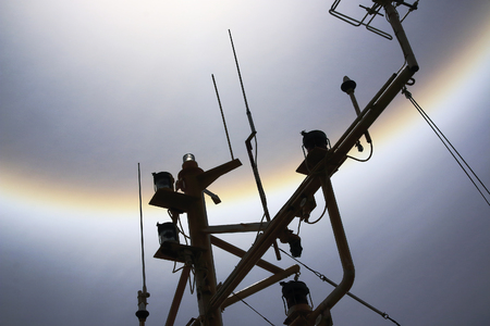 Misty halo over the mastの写真素材