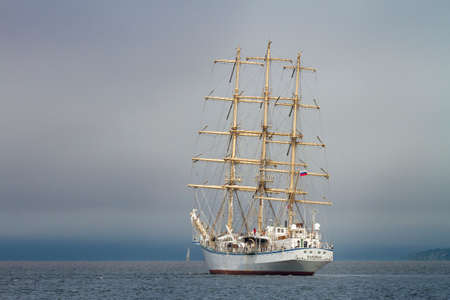 Vladivostok, Primorsky Krai, Russia 07/04/2020. Training sailboat Nadezhda in the Amur Bay on the background of fogのeditorial素材