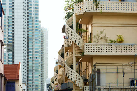 building with a spiral staircase in the historical quarter of Singapore