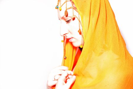 portrait of a woman in yellow scarfの写真素材