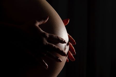 Belly in the darkの写真素材