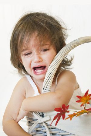 Girl and autumn leavesの写真素材