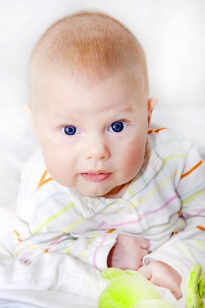 Portrait of a baby with toy
