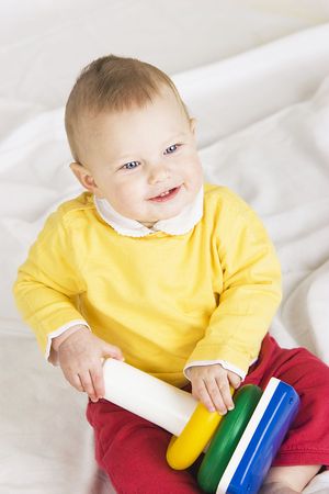 Baby boy with toyの写真素材