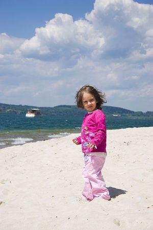 Little girl on the beachの写真素材