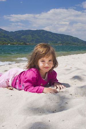 Little girl on the beachの写真素材