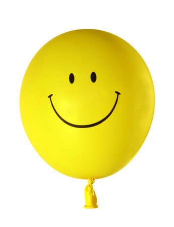 Smiling yellow balloon on white background