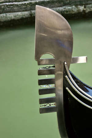 Gondolas ferro against the background of the shore of the narrow channelの写真素材